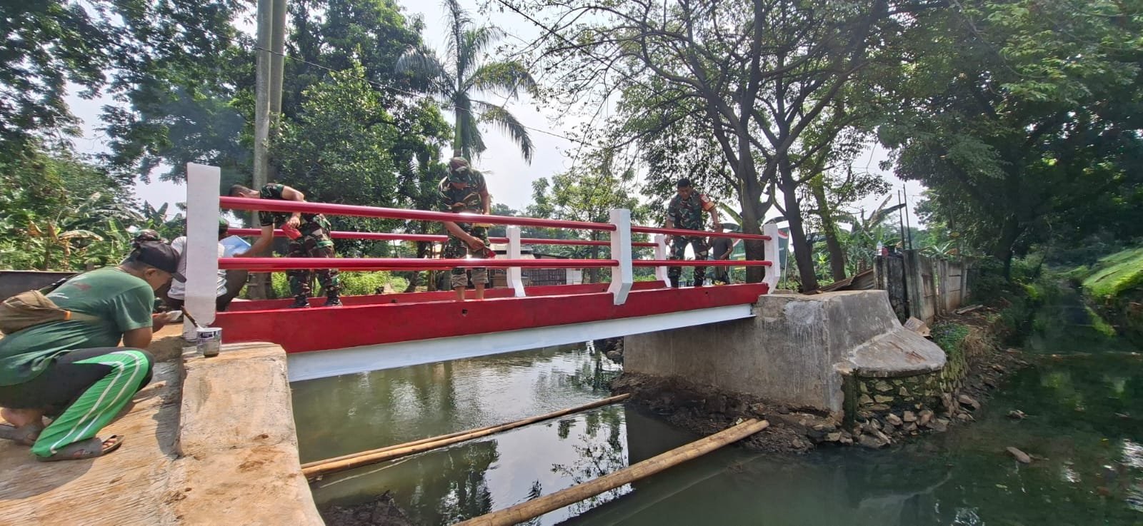 Kemanunggalan TNI dan Warga di Balik Pembangunan Jembatan Garuda ...